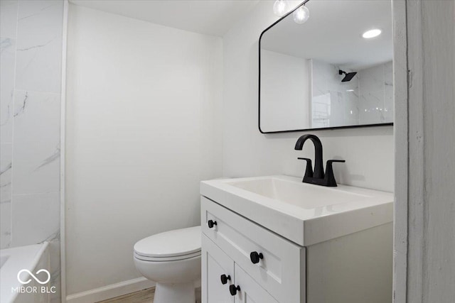 3218 N 24th St, Terre Haute, IN 47804 - bathroom featuring vanity, toilet, a shower, baseboards, and a tub