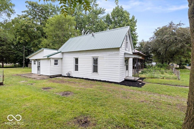 3218 N 24th St, Terre Haute, IN 47804 - view of property exterior featuring metal roof