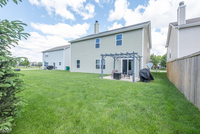 935 Northwich Ave, Westfield, IN 46074 - rear view of house featuring a pergola, a patio area, a lawn, and a chimney
