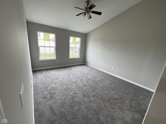 8939 Newchurch Blvd, Indianapolis, IN 46231 - carpeted spare room with vaulted ceiling, baseboards, and ceiling fan