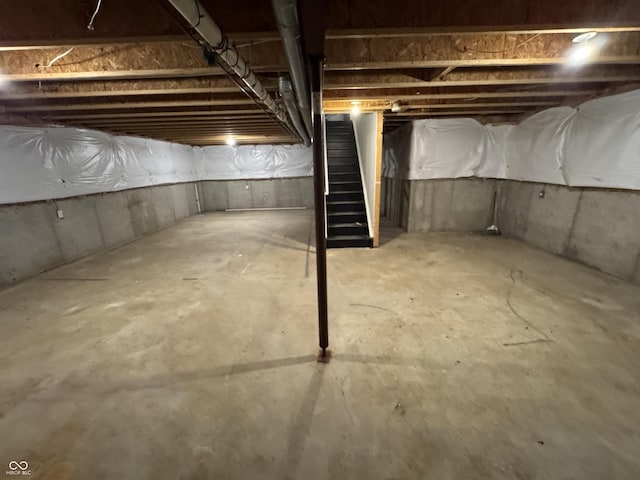 8939 Newchurch Blvd, Indianapolis, IN 46231 - unfinished basement featuring stairs