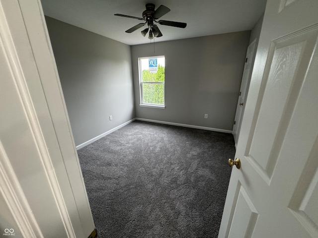 8939 Newchurch Blvd, Indianapolis, IN 46231 - empty room featuring carpet flooring, baseboards, and a ceiling fan