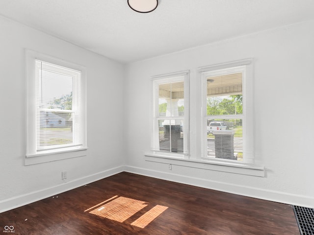 1209 W 22nd St, Anderson, IN 46016 - unfurnished room with wood finished floors and baseboards