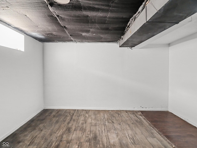 1209 W 22nd St, Anderson, IN 46016 - finished below grade area with wood finished floors and baseboards