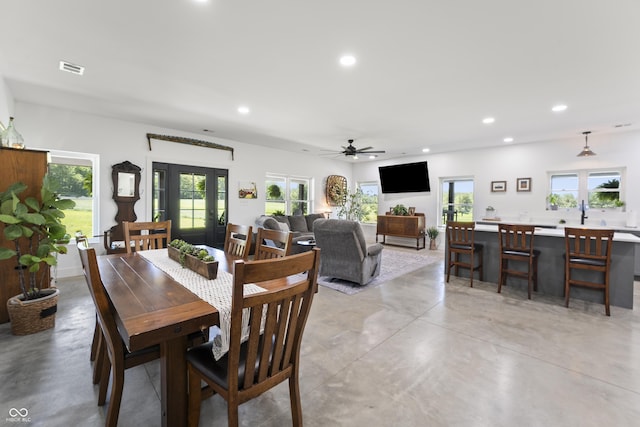 10104 E 850 S, Elizabethtown, IN 47232 - dining room featuring finished concrete floors, recessed lighting, plenty of natural light, and a ceiling fan