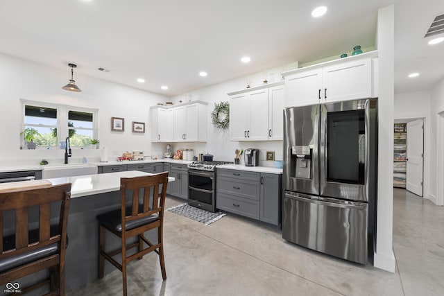 10104 E 850 S, Elizabethtown, IN 47232 - kitchen featuring appliances with stainless steel finishes, gray cabinetry, light countertops, a sink, and recessed lighting