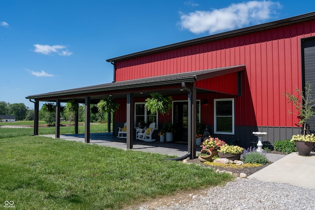 10104 E 850 S, Elizabethtown, IN 47232 - rear view of property featuring a lawn and a patio