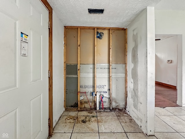 1947 N Parker Ave, Indianapolis, IN 46218 - miscellaneous room featuring a textured ceiling