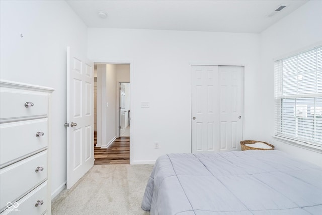 5304 Maywood Dr, Whitestown, IN 46075 - bedroom with light carpet, a closet, and baseboards