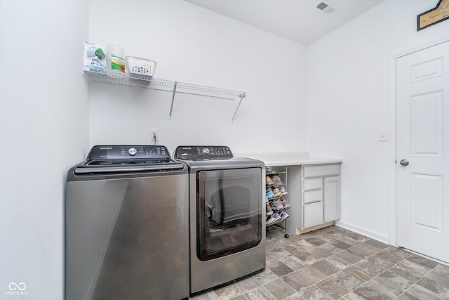 5304 Maywood Dr, Whitestown, IN 46075 - laundry room featuring independent washer and dryer, stone finish flooring, and baseboards