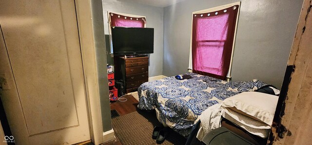315 S Rural St, Indianapolis, IN 46201 - bedroom featuring wood finished floors and baseboards