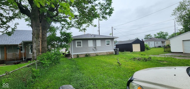 315 S Rural St, Indianapolis, IN 46201 - back of house featuring an outbuilding