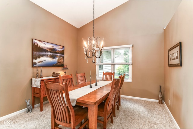 10759 Sawgrass Dr, Fishers, IN 46037 - dining room with lofted ceiling, light colored carpet, and a chandelier