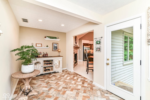 10759 Sawgrass Dr, Fishers, IN 46037 - home office featuring recessed lighting and brick floors