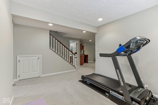 10759 Sawgrass Dr, Fishers, IN 46037 - workout room featuring carpet floors, recessed lighting, and a textured ceiling