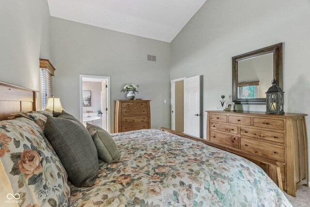 10759 Sawgrass Dr, Fishers, IN 46037 - carpeted bedroom featuring high vaulted ceiling and ensuite bath