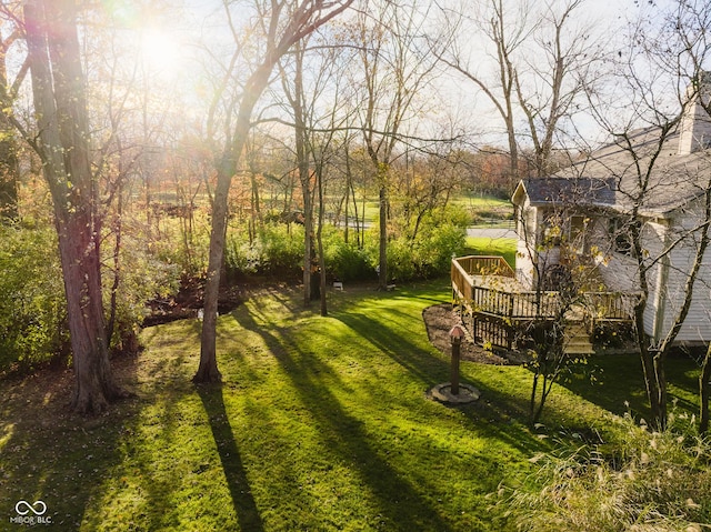 10759 Sawgrass Dr, Fishers, IN 46037 - view of green lawn featuring a wooden deck