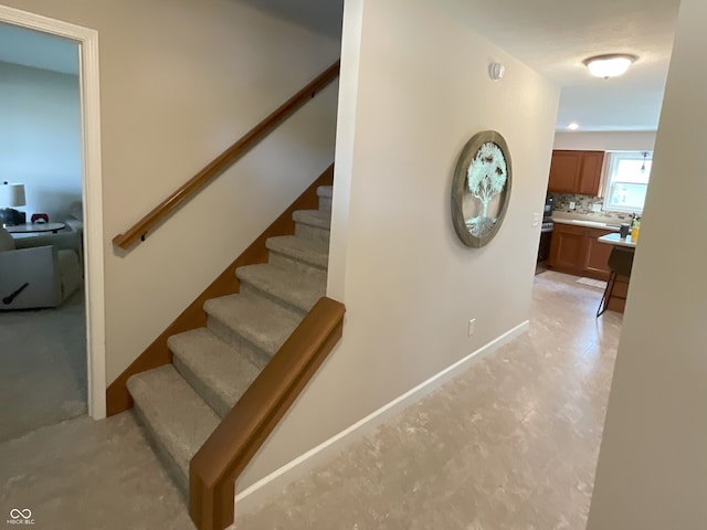 425 Bridgewater Ln S, Muncie, IN 47304 - stairs featuring baseboards
