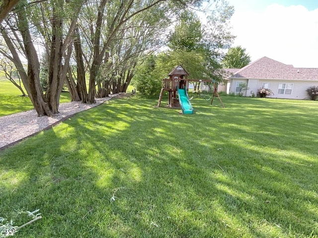 425 Bridgewater Ln S, Muncie, IN 47304 - view of grassy yard with a playground