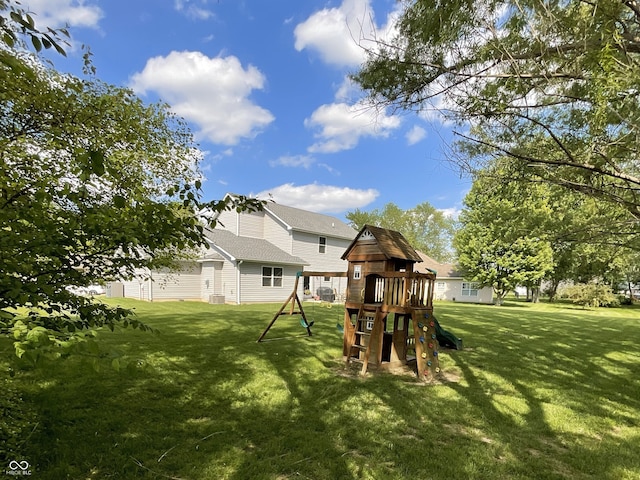 425 Bridgewater Ln S, Muncie, IN 47304 - view of grassy yard featuring a playground