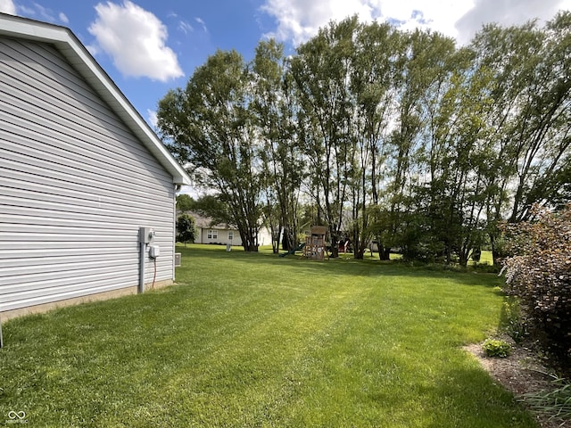 425 Bridgewater Ln S, Muncie, IN 47304 - view of grassy yard with a playground