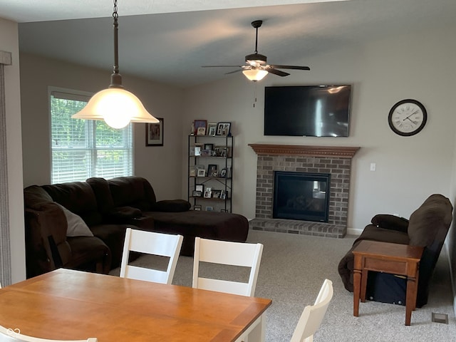 425 Bridgewater Ln S, Muncie, IN 47304 - carpeted dining room featuring a ceiling fan, a fireplace, and vaulted ceiling