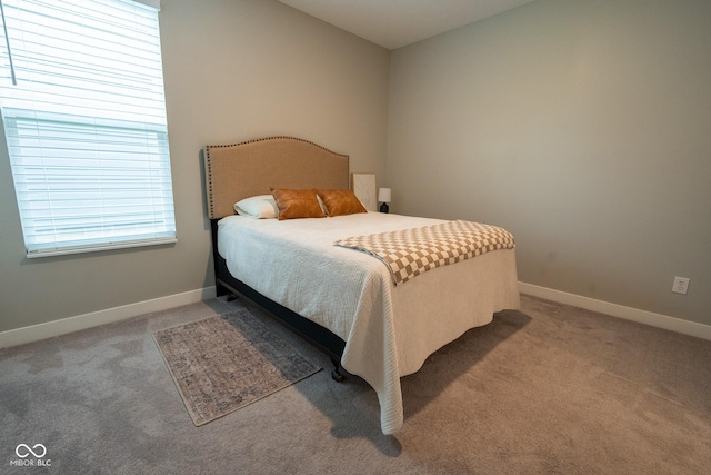 9741 Haughton Ln, Mccordsville, IN 46055 - bedroom featuring light carpet and baseboards