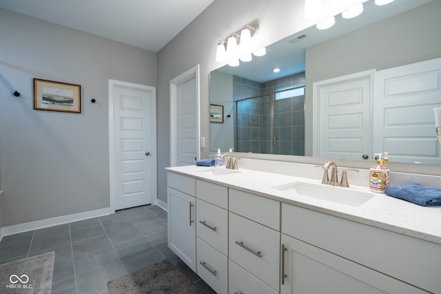 9741 Haughton Ln, Mccordsville, IN 46055 - bathroom featuring double vanity, a stall shower, and tile patterned floors