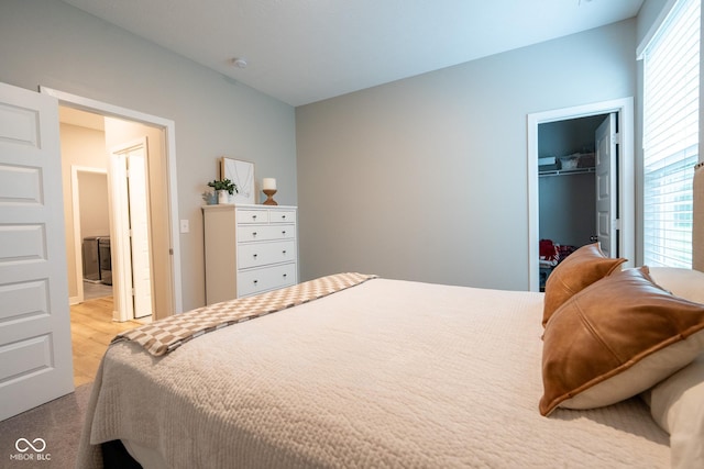 9741 Haughton Ln, Mccordsville, IN 46055 - bedroom featuring carpet, a walk in closet, and a closet