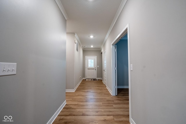 9741 Haughton Ln, Mccordsville, IN 46055 - corridor with ornamental molding and wood finished floors