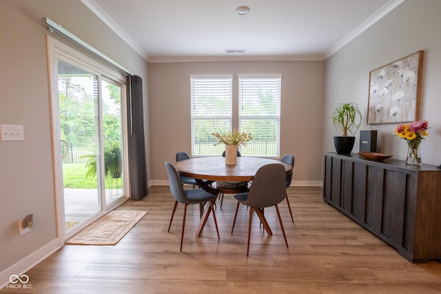 9741 Haughton Ln, Mccordsville, IN 46055 - dining space with crown molding and light wood-type flooring