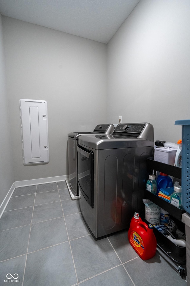 9741 Haughton Ln, Mccordsville, IN 46055 - laundry room featuring washer and clothes dryer and tile patterned flooring