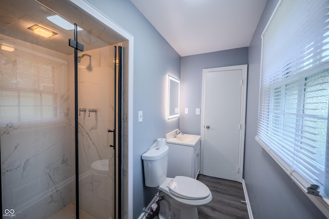3457 W 58th St, Indianapolis, IN 46228 - bathroom with vanity, a marble finish shower, wood finished floors, and toilet