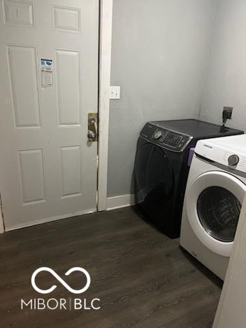 639 N Hamilton Ave, Indianapolis, IN 46201 - laundry room with separate washer and dryer, dark wood finished floors, and baseboards