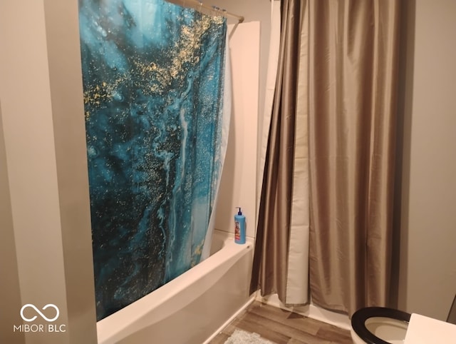 639 N Hamilton Ave, Indianapolis, IN 46201 - full bathroom with shower / tub combo, wood finished floors, and toilet