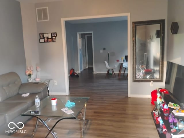 639 N Hamilton Ave, Indianapolis, IN 46201 - living room featuring wood finished floors and baseboards