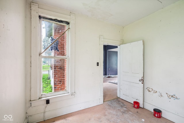 1514 W 2nd St, Marion, IN 46952 - unfurnished room with healthy amount of natural light and concrete floors
