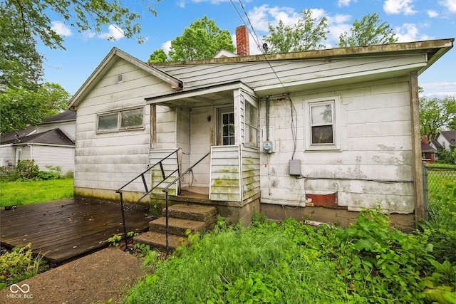 1514 W 2nd St, Marion, IN 46952 - view of front of house featuring a deck and a chimney