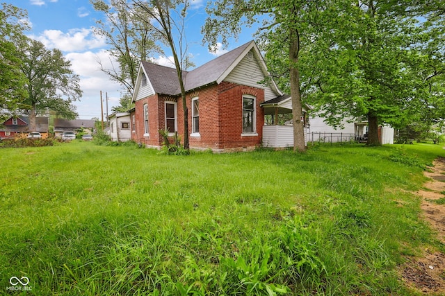 1514 W 2nd St, Marion, IN 46952 - view of side of property featuring brick siding