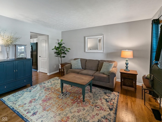 319 Mcintosh Ln, Westfield, IN 46074 - living area with dark wood-style floors and baseboards