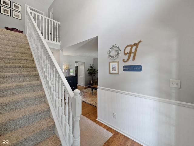 319 Mcintosh Ln, Westfield, IN 46074 - stairway with wood finished floors and wainscoting