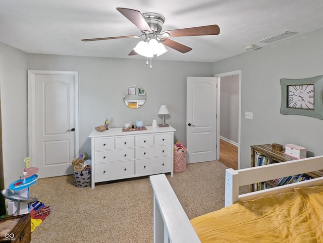 319 Mcintosh Ln, Westfield, IN 46074 - carpeted bedroom with a ceiling fan