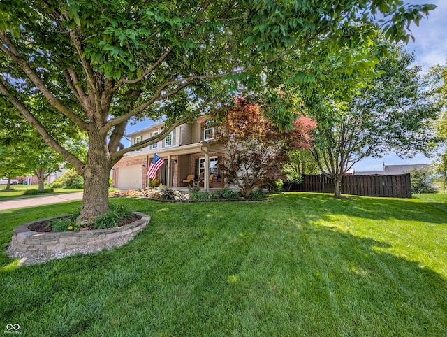319 Mcintosh Ln, Westfield, IN 46074 - view of yard with a garage and covered porch