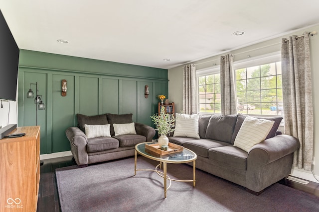 800 E 104th St, Carmel, IN 46280 - living room with wood finished floors, a decorative wall, and recessed lighting