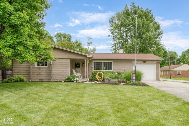 800 E 104th St, Carmel, IN 46280 - single story home with concrete driveway, an attached garage, a chimney, and brick siding