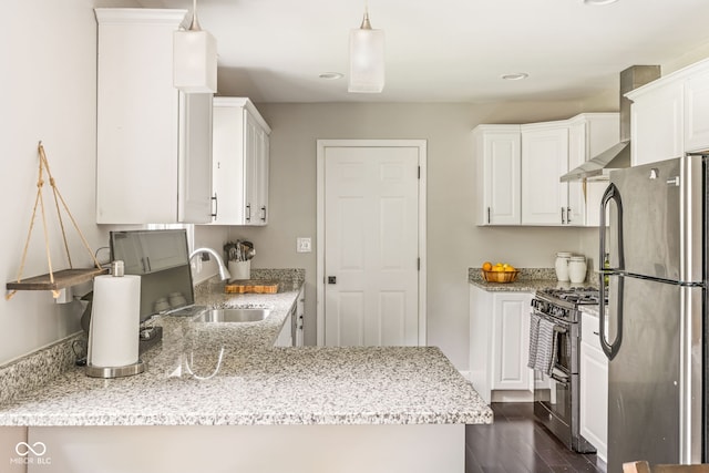 800 E 104th St, Carmel, IN 46280 - kitchen featuring appliances with stainless steel finishes, a sink, white cabinetry, light stone counters, and recessed lighting