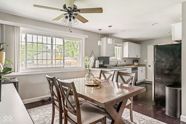 800 E 104th St, Carmel, IN 46280 - dining space with ceiling fan, dark wood finished floors, baseboards, and recessed lighting