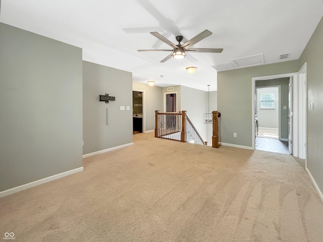 1843 Winchester Blvd, Avon, IN 46123 - unfurnished room with light carpet, baseboards, ceiling fan, and attic access