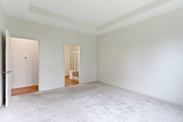 7248 Covington St, Lebanon, IN 46052 - unfurnished bedroom with carpet floors, ensuite bath, and baseboards