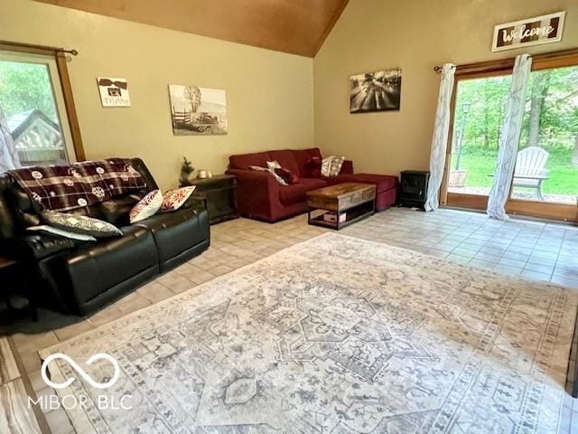 6774 S Becks Grove Rd, Freetown, IN 47235 - tiled living area featuring vaulted ceiling